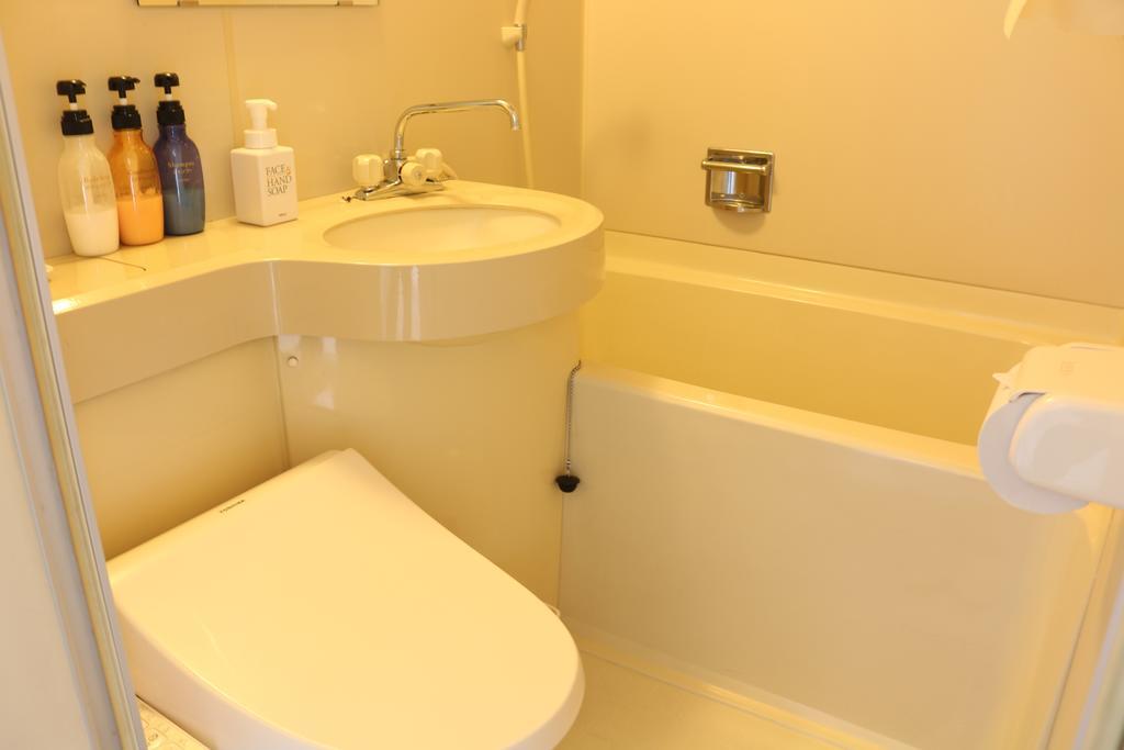 Hotel Sankeien Sapporo Quarto foto