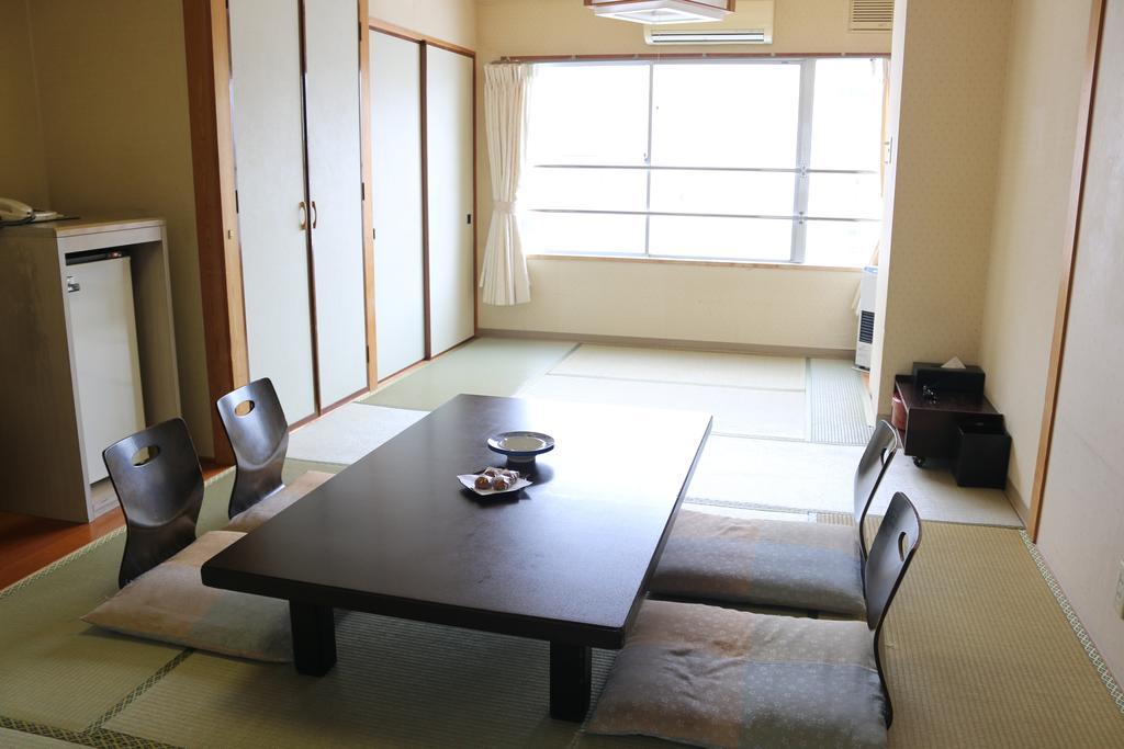 Hotel Sankeien Sapporo Quarto foto